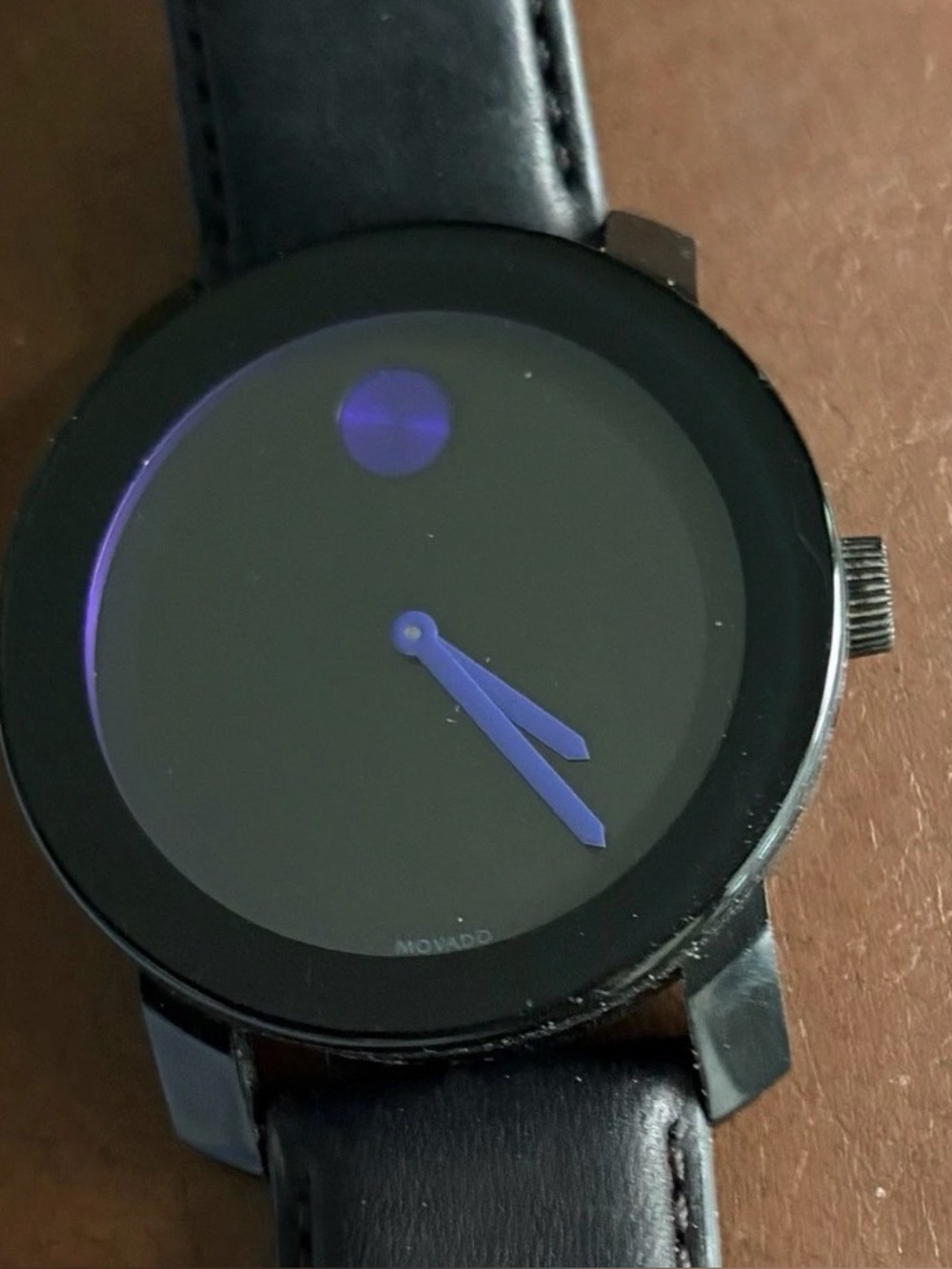Movado Black Watch with Purple Hands and Dot Accent